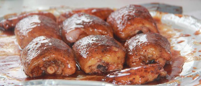 Cooked meat saturated in sauce