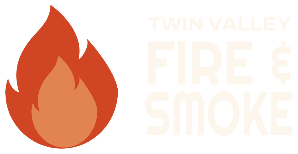 A flame logo. Twin Valley Fire and Smoke.